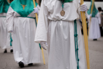 Hooded people in a procession, Holy Week