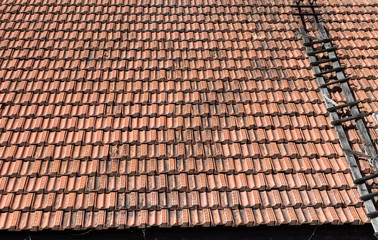 Fototapeta premium Old clay roof tiles at england house.