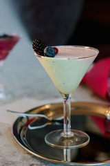Sweet mousse dessert with berries in a glass