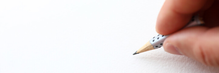 Male hand holding simple pencil stump