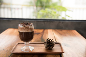 selective focus close up home made hot chocolate .Wood table top with chocolate in cafe  or (coffee shop,restaurant ) Selective focus background
