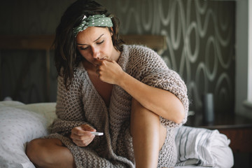Sad woman after pregnancy test result