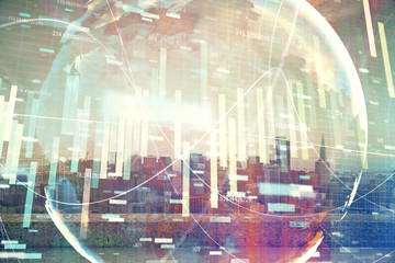 Double exposure of business theme hologram drawing and city veiw background. Concept of success.