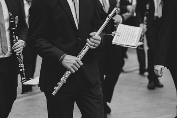 Man holding a transverse flute
