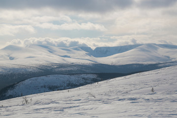 Fototapeta na wymiar winter mountain landscape with mountains and blue sky