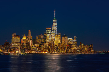 Obraz premium Lower Manhattan which is a apart of New york cityscape river side which can see One world trade center at twilight time, USA, Taking from New Jersey