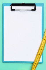 empty paper and measuring tape for background