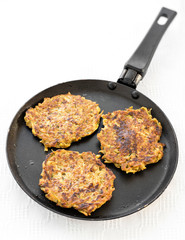 Healthy vegetable pancakes on the pan
