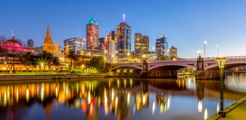 Fototapeta na wymiar Melbourne Australia Cityscape after sunset from Southbank showing the Princes Bridge.