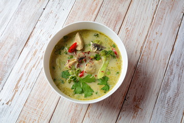 Traditional Thai cuisine, Thai Spicy Green curry chicken soup withcoconut milk, mushrooms and broccoli. Healthy food