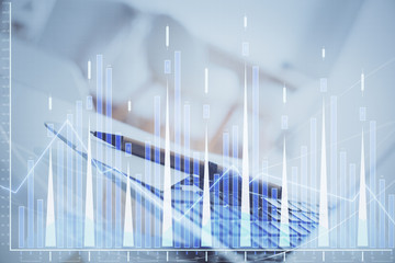 Forex Chart hologram on table with computer background. Double exposure. Concept of financial markets.