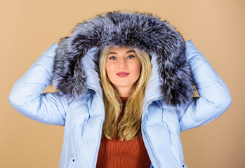 Cheerful winter girl. girl in puffed coat. faux fur fashion. woman in padded warm coat. beauty in winter clothing. cold season shopping. happy winter holidays. flu and cold. seasonal fashion