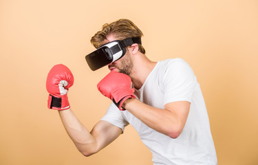 boxing in virtual reality. Digital sport success. man in VR glasses. Futuristic gaming. vr boxing. future innovation. man use new technology. modern gadget. Training boxing game. Great progress