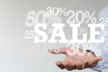 sale digital percent in hand