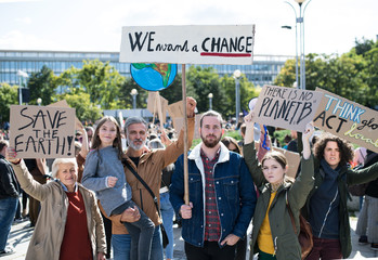 People with placards and posters on global strike for climate change.