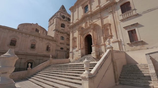 The spectacular fa&ccedil;ade of the Baroque church of S. Francesco d'Assisi and monastery of S. Salvatore in Noto, Sicily Italy.