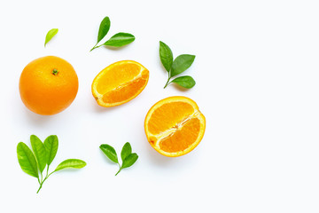 Fresh orange citrus fruit with leaves isolated on white background.
