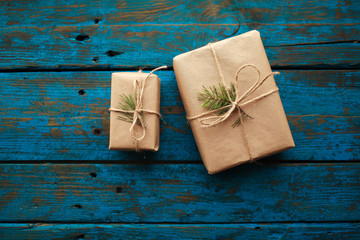 Christmas present on blue wooden table