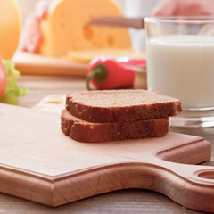 sandwich with cheese on a wooden board
