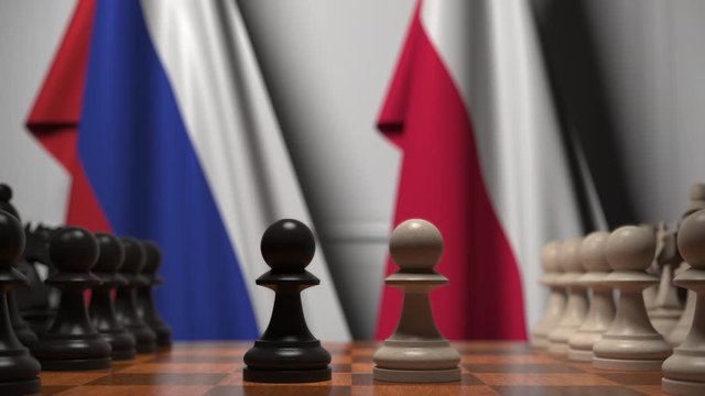 Flags of Russia and Poland behind pawns on the chessboard. Chess game or political rivalry related 3D animation