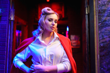 Fototapeta premium Photo of serious blonde at disco