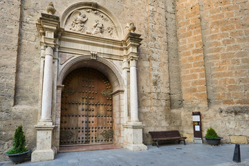 Fototapeta na wymiar Door Church Incarnation in Loja. Granada. Spain