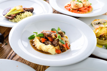 set of prepared dishes on the table of meat and vegetables