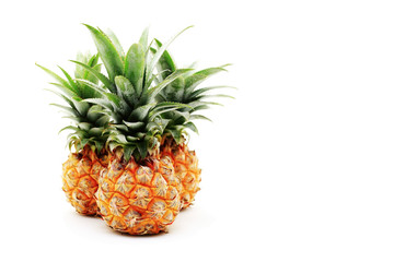 fresh organic pineapples on white background
