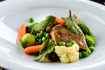 beef tongue dish with vegetables