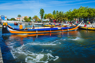 Gondolas for tourists on the channel of a portuguese city