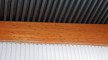 Abstract architecture image with glulam, tin roof and wall.