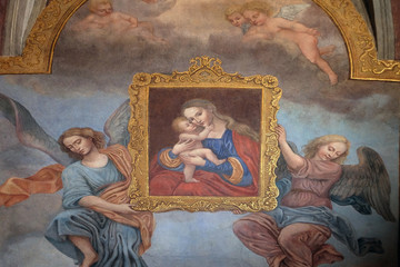 Fototapeta na wymiar Virgin Mary with baby Jesus, fresco in the Franciscan Church of the Annunciation in Ljubljana, Slovenia 