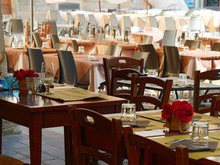 cafe tables on the street in Mantova, Italy