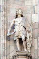 Obraz premium Statue of Saint on the facade of the Milan Cathedral, Duomo di Santa Maria Nascente, Milan, Lombardy, Italy