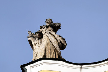 Angel on facade of Barmherzigenkirche church in Graz, Styria, Austria 
