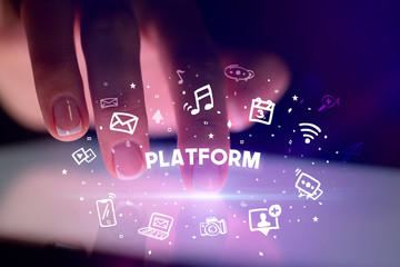 Finger touching tablet with drawn social media icons and PLATFORM inscription, social networking concept