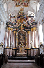 Fototapeta na wymiar Main altar in Amorbach Benedictine monastery church in Lower Franconia, Bavaria, Germany