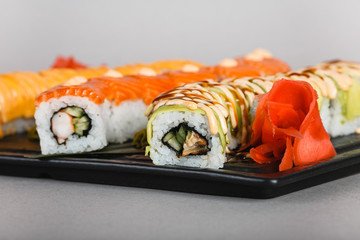 japanese national food, sushi on light background