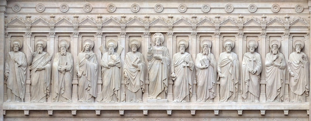 Jesus Christ with Apostles, facade of Saint Augustine church in Paris, France 