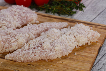 Raw chicken cutlet