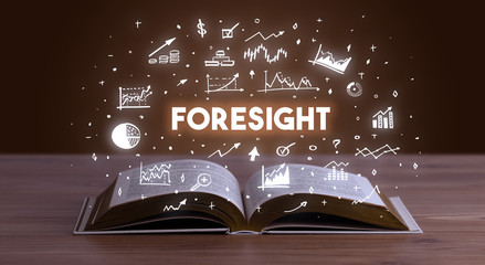 FORESIGHT inscription coming out from an open book, business concept - obrazy, fototapety, plakaty