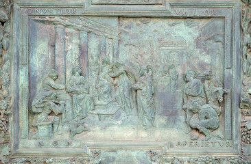 Visitation of the Virgin Mary, detail of the central door of the Cathedral St. Mary of the Assumption in Pisa, Italy 