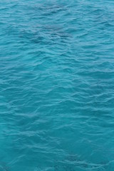 Fototapeta na wymiar transparent pale blue azure water in the sea