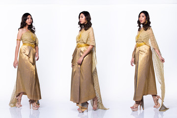 Golden Dress of Thai Traditional Costume or South East Asia gold Dress in Asian Woman with decoration stand in many poses Collage Group Pack under Studio White background isolated 360  full length