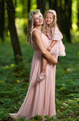 Pregnant woman and her daughter