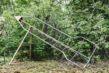 PRIPYAT, UKRAINE - AUGUST 15, 2019: retired man and woman holding black and white photo near building