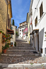 Fototapeta na wymiar A road between the houses of an Italian mountain village