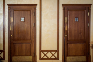 interior of a hotel or restaurant. Wooden door, large windows