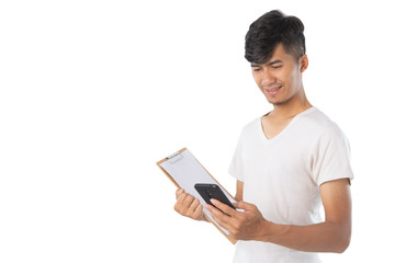 Handsome Asian man with finger point and using phone to clipboard.