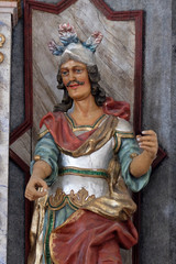 Obraz premium Statue of Saint Florian on the main altar in the Church of Assumption of the Virgin Mary in Pokupsko, Croatia
